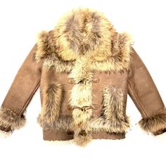 skin: Fox, Shearling style: shearling color: cocoa Luxury Sheepskin Outerwear With Faux Fur Trim, Luxury Sheepskin Leather Jacket With Faux Fur Lining, Brown Fur Coat With Faux Fur Trim, Brown Long Sleeve Fur Coat With Faux Fur Trim, Brown Sheepskin Outerwear With Faux Fur Lining, Shearling Fur Coat With Faux Fur Lining, Mink-colored Sheepskin Winter Fur Coat, Mink Colored Sheepskin Fur Coat For Winter, Winter Mink Color Sheepskin Fur Coat