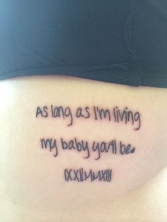 a tattoo saying as long as i'm living my baby you'll be