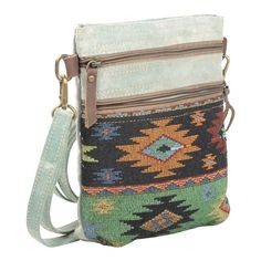 Trendy Aztec prints and Mixed Fabrics Crossbody Shoulder Bag/Purse by Clea RayCanvas Bag with Genuine Leather Trim and Adjustable Strap. Plenty of space to safeguard all you essentials. Two zippered pockets on front, one pocket on back, one inner zippered pocket. Re-purposed Military Tent Canvas, Blue and White Striped Lining.Dimensions: 9.5" x 1.7" x 9.75"Clea Ray bags are designed and hand crafted using re-purposed canvas and military tents. Made with Recycled Materials. repurposed, reclaimed, Rectangular Shoulder Bag With Cell Phone Pocket For Trip, Multicolor Bags With Zipper Pocket For Trips, Multicolor Shoulder Bag With Zipper For Travel, Multicolor Bags With Zipper Closure For Trip, Multicolor Trip Bag With Pockets, Multicolor Travel Bag With Pockets, Multicolor Zipper Pocket Bag For On-the-go, Multicolor Shoulder Bag With Zipper Pocket For On-the-go, Multicolor On-the-go Bag With Zipper Pocket