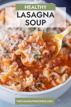 a spoon full of lasagna soup in a white bowl with the title above it