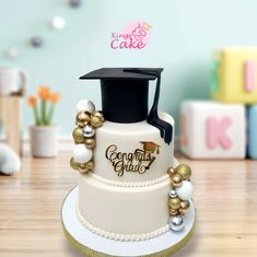 a cake with a graduation cap on top