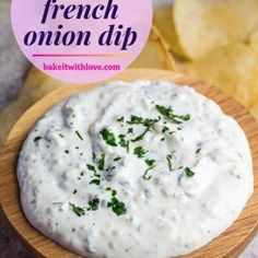 a wooden bowl filled with ranch dip next to chips and a pink sticker that says french onion dip