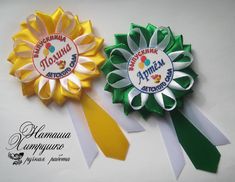 two ribbons with the names of different countries are shown in front of a white background