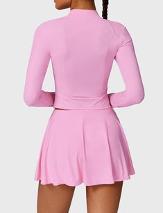 Elevate your sporty look with this 2-piece tennis skirt set, featuring a long-sleeve zip-up top and high-waisted skirt made from UPF50+ fabric that blocks 96% of UV rays. Lightweight and quick-drying, it offers comfort, breathability, and built-in shorts for added coverage. Perfect for tennis, golf, or casual wear—add both pieces to your cart!   Feature    Long sleeve top   Zipper design   Built-in shorts   UPF 50+   Moisture-wicking   Super soft fabric    Fabric    87% Nylon + 13% Spandex Yoga Day, Sport Bra Top, Skirt Sets, V Cuts, Tennis Skirt, Sporty Look, Top Sales, Gym Wear, Sporty Style