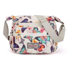 PRICES MAY VARY. Super practical: Made of practical water resistant and stain resistant nylon fabric that is durable lightweight high quality construction, easy to care for wipe clean or machine wash Size: 10.6 x 7.8 x 9.8 inches(25cm*23cm*11cm) Adjustable shoulder strap, smooth zipper. Unique printing floral pattern,be unconventional and make an individual statement of fashion Large capacity: Large capacity with 1 inner zipper pocket, 3 front pockets, 2 side pockets. This bag fit in quite a bit Waterproof Crossbody Bag, Over The Shoulder Bags, Women Crossbody Bag, Travel Handbags, Tote Bag Purse, Handbag Straps, Toiletry Bag Travel, Pocket Bag, Retro Chic