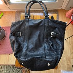 Gorgeous Soft Black Leather Handbag From Liebeskind Berlin. In Excellent Condition With No Issues. Measures 13” High, 18” Wide With A 7” Base Width. Has Four Silver Feet. The Interior Has A Zippered Picket And Open Slip On One Side And Two Open Slips On The Other Side. The Strap Drop Is Approximately 9”. Double Handles With A Top Zip Closure. Black Shoulder Bag With Palladium Hardware For Travel, Everyday Black Satchel With Palladium Hardware, Black Top Handle Satchel With Leather Backing, Tote Bags With Palladium Hardware For Errands, Black Shoulder Bag With Leather Lining For Errands, Black Textured Leather Satchel For Errands, Designer Shoulder Bag With Leather Backing For Everyday Use, Black Leather Handbag, Black Leather Handbags