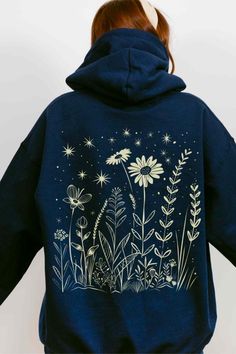 Wrap yourself in the magic of the stars with this celestial wildflower hoodie! Perfect for adding a touch of whimsy to your cottagecore and countrycore aesthetic outfits, this celestial sweatshirt features enchanting wildflower and starry designs. Ideal for cozy days in the countryside or star-gazing nights! #CelestialSweatshirt #CelestialHoodie #Cottagecore #CountrycoreAestheticOutfits Aesthetic Cotton Hooded Hoodie, Cotton Aesthetic Hooded Sweatshirt, Aesthetic Long Sleeve Cotton Hoodie, Cotton Hooded Sweatshirt With Aesthetic Style, Aesthetic Hooded Hoodie For Fall, Aesthetic Cotton Hoodie, Aesthetic Cotton Hoodie Sweatshirt, Countrycore Aesthetic, Granola Girl Aesthetic Outfits