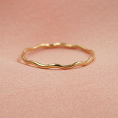 Capture the beauty of the sea with our new Ripple Ring. We love the wavey design. It adds the perfect beachy vibe to your look whenever you feel like taking a stroll along the shore. DETAILS 14kt gold filled or sterling silver 1mm thick band Available in sizes 5-8 tarnish free and waterproof Everyday Jewelry, 14kt Gold, Feel Like, The Sea, Gold Filled, Gold Rings, Jewelry Design, How Are You Feeling, Take That