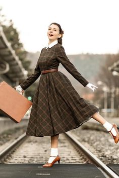 Thanks for @rou_quette wear the plaid wool dress. This plaid dress is suitable for all occasions, and the vintage plaid elements will make you love it even more. Great for fall and winter, fit and flare, and can be made to fit you as well! DETAIL * 30% wool, 30% fiber, 40% polyester * fully satiny lining, more nice to the touch body * Crew neckline * Long sleeves dress * Fit and flare dress * Back zipper closure * Two side seam pockets * Midi wool dress, Long wool dress * Plaid wool dress, Retro Fit And Flare Dress Long, Wool Dress Winter, Warm Dress, Custom Dress, Dress Winter, Warm Dresses, Vintage Plaid, Dress Long Sleeve, Wool Dress