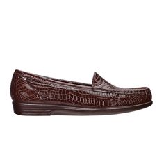 Product Description: For those who like to keep it simple, here's a moccasin loafer with timeless style. Soft leather with padded lining wraps completely around the foot for a plush feel. A removable cushioned footbed and a lightweight shock-absorbing sole supports you with every step. Simplify features many beautiful smooth and textured leathers. Heel Height: 1.00". This item features a removable footbed. Product Details: Designed to follow the shape and natural arches of your foot, Simplify ut Classic Synthetic Moccasins With Rubber Sole, Classic Synthetic Slip-on Moccasins, Classic Synthetic Moccasins With Round Toe, Elegant Brown Moccasins With Cushioned Footbed, Elegant Slip-on Synthetic Moccasins, Elegant Synthetic Slip-on Moccasins, Comfortable Brown Moccasins For Workwear, Comfortable Brown Moccasins For Work, Orthopedic Shoes