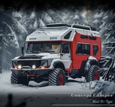 a red and white truck parked in the snow