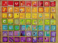 an art work with many different colored squares and designs on the surface, all in various colors