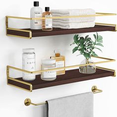 two shelves with towels, soaps and other items on them