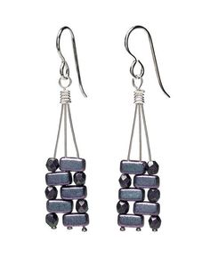 two pairs of earrings with beads hanging from them