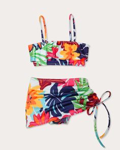 The Leanna set is a must-pack for your mini for your next family getaway. This set features a ruffle bikini top & matching skirt with a built in bikini bottom perfect for playing poolside or days on the beach. Wear the Barbara Halter Bikini Top and the Isla Flower Printed Bikini Bottom to match with your mini. Size & Fit – Fits true to size, take their normal size Size Guide Details & Care – 100% Polyester– Dry Clean or Hand Wash– Style #: S11238002– Style Exclusive Free Delivery & Easy Returns Multicolor Swim Skirt For Vacation Swimming, Playful Floral Print Swimwear For Vacation, Playful Floral Print Vacation Swimwear, Family Getaways, Tropical Flower, Ramy Brook, Madison Avenue, Beach Wear, Tropical Flowers