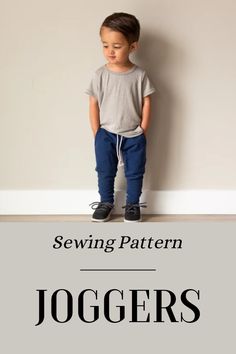 a young boy standing on top of a wooden floor next to a wall with the words sewing pattern joggers