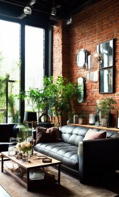 a living room filled with lots of furniture next to a large window covered in plants