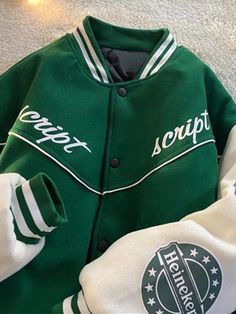 Vintage Logo Graphic Varsity Jacket Green Varsity Outerwear With Baseball Collar, Casual Green Varsity Jacket With Letter Print, Retro Long Sleeve Outerwear With Letter Embroidery, Fall Hooded Varsity Jacket With Letter Embroidery, Hooded Varsity Jacket With Letter Embroidery For Fall, College Varsity Jacket With Letter Print In Green, Winter Outerwear With Letter Embroidery And Baseball Collar, Urban Outerwear With Letter Embroidery For Winter, Urban Winter Outerwear With Letter Embroidery