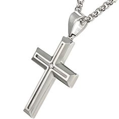 Accessorize in glorious style with this men's stainless steel cross pendant that highlights a diamond-accent in the center. Metal: Stainless steelMetal Color: WhiteStones: Diamond accentClosure: Lobster claspLength: 24" curb chainSome diamonds consist of fewer than 17 facets.Jewelry photos are enlarged to show detail. Jewelry Photos, Stainless Steel Cross Pendant, Steel Cross, Cross Pendant Necklace, Religious Jewelry, White Stone, Steel Metal, Photo Jewelry, Cross Pendant