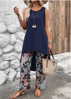 Elevate your casual wear with this Lightweight Tribal Print Navy Ankle Length Top and Pants set. Designed with a stunning tribal print, this outfit effortlessly combines comfort and style. The navy blue hue adds a touch of elegance, while the ankle-length pants and relaxed top offer a perfect blend of chic and laid-back vibes. Ideal for casual outings or cozy days at home, this set ensures you stay stylish and comfortable all day long. Spring Collection Fashion, Navy Summer Dress, Sun Set, Over 50 Womens Fashion, African Style, Print Dresses, Fall Fashion Trends, Plus Size Swimwear, Plus Dresses