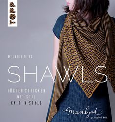 a woman is wearing a shawl and standing in front of a gray background with the words shawls written below it