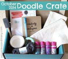 a box filled with crafting supplies sitting on top of a table