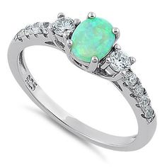 Sterling Silver Enchanted Oval Green Lab Opal CZ Ring – Dreamland Jewelry Silver Diamond Jewelry, White Opal Ring, Green Fire, Silver Gold Jewelry, Fire Opal Ring, Sterling Silver Cross Pendant, Green Opal, Stone Setting, Sterling Silver Cross