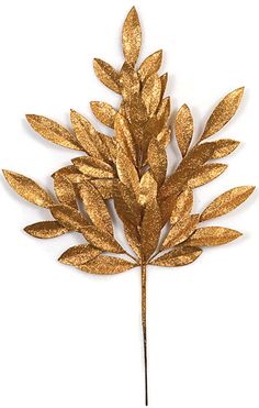 a gold leaf on a white background