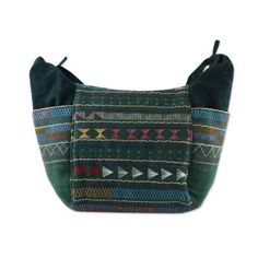 Brilliant color evokes a carnival as Lusi hill tribe artisans from Thai Tribal Crafts celebrate their textile legacy. They work in olive green cotton and add applique from the Akha people. Colorful embroidery completes a vivid and versatile hobo bag bag. Lined in cotton and satin it features an inner pocket and outer pockets on each side. Handmade Green Canvas Shoulder Bag, Green Cotton Hobo Bag For Travel, Bohemian Canvas Hobo Bag, Green Cotton Hobo Bag For Daily Use, Green Artisan Woven Bags, Green Travel Bags With Weaving Details, Green Cotton Hobo Tote Bag, Green Woven Tote Bag, Green Handwoven Bag For Festival