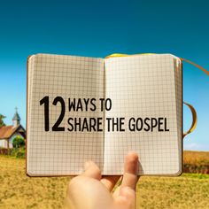 someone is holding up an open book with the words 12 ways to share the gospel