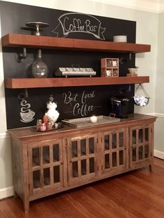 a coffee bar with chalk writing on the wall