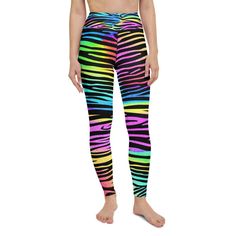 The Gearbunch Colorful Zebra Striped Yoga Pants are signature Gearbunch......bright, colorful, unique, super soft, stretchy, and comfortable wide elastic waistband.  A rainbow of vibrant colors' blue, green, pink, black, yellow, orange and purple, these leggings are perfect for your active lifestyle and can be worn at anytime, anywhere. Be Happy, Be Bright, Be You with Gearbunch Bold Multicolor Spring Pants, Trendy Stretch Colorful Pants, Bold Multicolor Spring Bottoms, Multicolor Athleisure Bottoms With Elastic Waistband, Athleisure Multicolor Bottoms With Elastic Waistband, Playful Multicolor Spring Pants, Sporty Multicolor Bottoms With Elastic Waistband, Multicolor High Waist Workout Bottoms, Sporty Multicolor Workout Pants