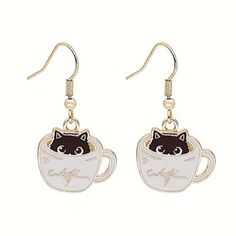 This Cat Loves Coffee Just As Much As You Do. These Enamel Earrings Feature A White Coffee Cup With Gold Toned Trim Which Reads “Catfe” Instead Of Coffee With A Little Black Cat Hiding Inside It. Adorable!!! See My Other Listings For More Jewelry. Bundle And Save On Shipping. #E96 Instead Of Coffee, Coffee Cup Earrings, White Coffee Cup, White Coffee Cups, Cat Hiding, Mermaid Earrings, Sunflower Earrings, Silver Jewelry Earrings, Spike Earrings