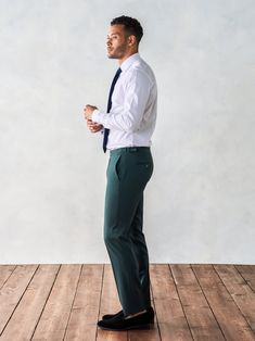 Green Fitted Evening Suit, Green Evening Suits With Notch Lapel, Green Evening Suit With Notch Lapel, Green Notch Lapel Evening Suit, Elegant Green Formal Suit, Elegant Green Suit With Pressed Crease, Elegant Green Tuxedo For Parties, Elegant Green Suit With Notch Lapel, Fitted Green Tuxedo For Semi-formal Events