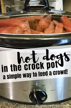 a crock pot with hot dogs in it and the words hot dogs in the crock pot