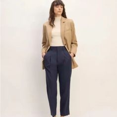 Everlane The Way-High Taper Pant Color: Navy Blue Women's Size 8 New Without Tags! Extra Button Included Featuring A Tapered Leg, Ankle Length, The Way-High Taper Pant Has A Non-Stretch Waistband (We Suggest Sizing Up If You Prefer More Ease Here), An Extra-High Rise, Two Side Pockets, And A Flattering Pleat Detail. 60% Tencel, 40% Cotton Machine Washable Imported Approximate Measurements: Waist 15" Across Laying Flat, Rise 13", Inseam 27" Size: Womens 8 Condition: New Without Tags Everlane Spring Workwear Pants, Fitted Everlane Bottoms For Workwear, Everlane Fall Workwear Pants, Everlane Relaxed Fit Pants For Work, Everlane Fitted Pants For Workwear, Everlane Straight Leg Business Casual Bottoms, Everlane Straight Leg Bottoms For Business Casual, Everlane Straight Leg Pants For Business Casual, Everlane Tapered Leg Work Pants