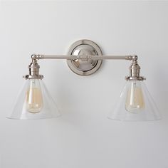 two light bathroom fixture with clear glass shades