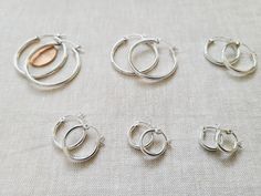 14K Gold Filled Hoop Earrings, Plain hoop snap post gold filled earrings, Classic everyday light weight hoop earrings, stacking hoops, Round Tube Gold Filled, Round Click Hoop Earrings 14K Gold Filled Hoop Earrings - 2.2mm - 12mm 14K Gold Filled Hoop Earrings - 2.2mm - 15mm 14K Gold Filled Hoop Earrings - 2.2mm - 18mm 14K Gold Filled Hoop Earrings - 2.2mm - 22mm 14K Gold Filled Hoop Earrings - 2.2mm - 34mm 14K Rose Gold Filled Hoop Earrings: https://www.etsy.com/listing/1014219384/14k-rose-gold- Classic Round Stackable Hoop Earrings, Silver Stackable Hoop Earrings For Everyday, Adjustable Stackable Earrings For Everyday, Everyday Adjustable Stackable Earrings, Adjustable Stackable Hoop Earrings For Everyday, Gift Small Hoop Stackable Earrings, Small Hoop Stackable Earrings As Gift, Silver Huggie Hoop Earrings Stackable, Adjustable Stackable Hoop Earrings