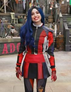 a woman with blue hair wearing a red and black outfit