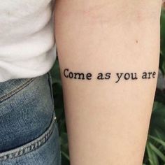 someone with a tattoo that says, come as you are on their left arm and the word