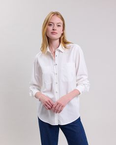 Women's cotton twill shirt with long sleeves and simple cuffs. Visible snap button placket. Two patch pockets. White Buttoned Pockets Shirt For Work, White Shirt With Buttoned Pockets For Work, White Cotton Dress Shirt With Button Cuffs, Classic White Shirt With Buttoned Pockets, White Long Sleeve Shirt With Buttoned Pockets, Cotton Button-up Shirt With Button Cuffs, Cotton Button-up Dress Shirt With Button Cuffs, Everyday Shirt With Spread Collar And Button Cuffs, Everyday Shirt With Button Cuffs And Spread Collar