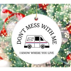 a christmas ornament that says, don't mess with me i know where you live