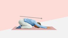 a woman in blue shirt and white pants doing yoga on pink mat with black pole