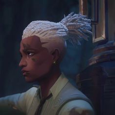 a woman with white hair and dreadlocks looks off into the distance