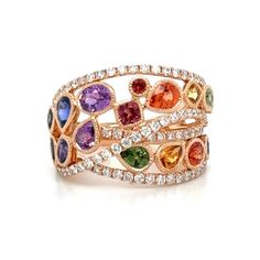 This exquisite multiple-shape rainbow sapphire rose gold ring shimmers with vibrant hues of sapphire. Its delicate rose gold band is crafted to perfection, making it a stunning piece of statement jewelry. Radiate your passions with this captivating and unique ring! Metal: 18K Rose GoldRound Cut 82 Diamonds: 0.79ct tw16 Multiple-Cut Rainbow Sapphires: 2.53ct tw - Width: 16mmSetting: Prong, Pave Sizable, desired ring size please leave us a note at the check out. Sapphire Rose Gold Ring, Rainbow Sapphires, Rainbow Jewelry, Rose Gold Band, Sapphire Diamond Ring, Unique Ring, Ring Metal, White Rose Gold, Sapphire Diamond