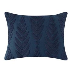 a blue pillow with an embroidered design on the front and back, in dark blue