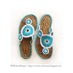 a pair of blue and brown slippers sitting on top of each other