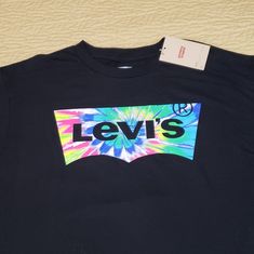 Levi's Rainbow Tie Dye Logo T Shirt. Size L, Brand New With Tags. Trendy Levi's Graphic Print T-shirt, Levi's Logo Print Tops For Summer, Trendy Levi's Graphic Print Tops, Levi's Black Graphic Print Top, Levi's Graphic Print Tops For Spring, Levi's Black Short Sleeve T-shirt, Levi's Black Short Sleeve Tops, Levi's Black Casual T-shirt, Levi's Black Summer Tops