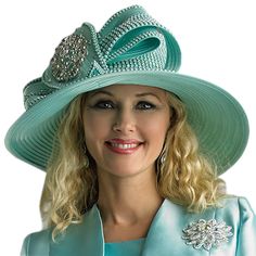 Presenting the Lily And Taylor H383-MNT Church Hat, a symbol of sophistication and grace designed to complete your Sunday attire. Crafted with meticulous attention to detail, this hat boasts a serene mint green shade that evokes a sense of calm and purity, perfectly complementing the spirit of any church-going occasion. The hat's silhouette reveals a modern twist on classic styles with its expansive wide brim that not only provides ample sun protection but also adds an undeniable chic touch to y Elegant Green Cloche Hat, Elegant Green Flat Brim Hat, Elegant Green Top Hat For Evening, Elegant Green Mini Hat With Curved Brim, Classic Green Hat For Kentucky Derby, Elegant Green Hats For Spring, Elegant Green Hat For Evening, Elegant Green Top Hat For Spring, Elegant Green Mini Hats With Short Brim