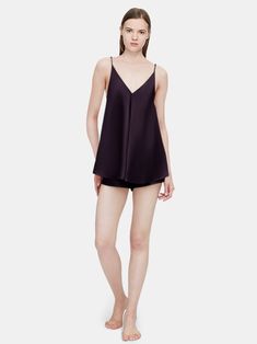 Beautifully crafted from lustrous silk, this sexy silk camisole and shorts set ensures an exquisitely comfortable fit. Delicately suspended from thin adjustable straps with an alluring V-neckline to showcase a hint of décolletage, paired with the matching shorts for after-dark elegance. Dark Elegance, Silk Camisole, Sleepwear & Loungewear, Short Pajama Set, Pajama Sets, Pajama Shorts, After Dark, Shorts Set, Dark Purple